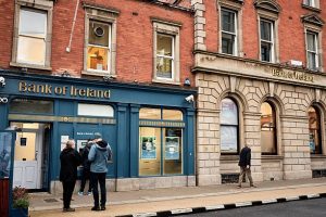 imgi_49_bank-of-ireland-branch-on-merrion-row-dublin-with-red-brick-facade-and-people-on-the-street