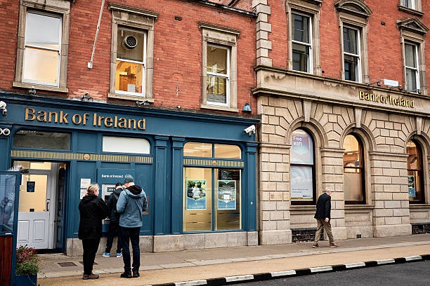 imgi_49_bank-of-ireland-branch-on-merrion-row-dublin-with-red-brick-facade-and-people-on-the-street